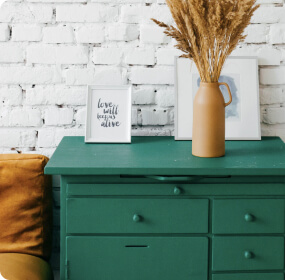 Green furniture with decorations on it